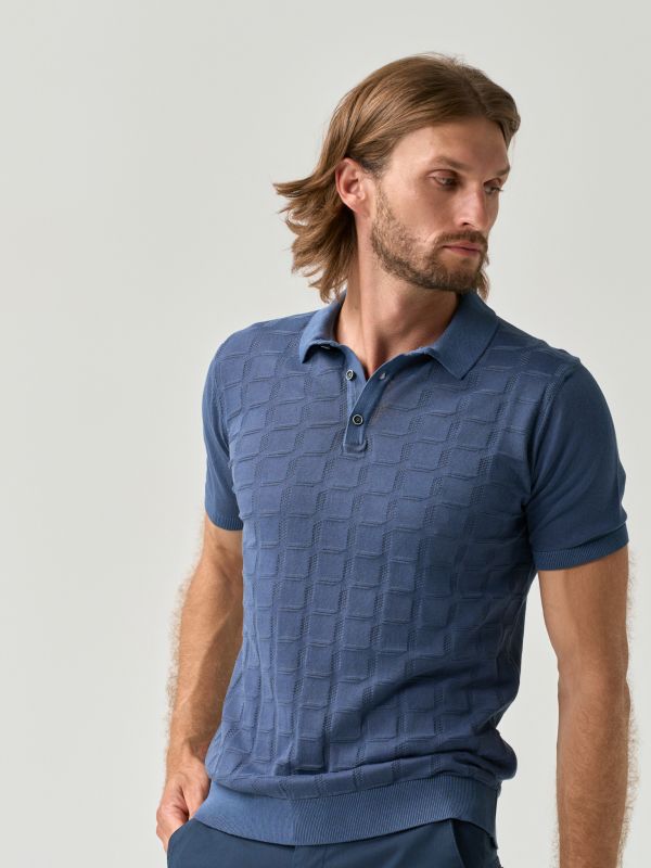 Textured blue polo shirt with versatile design for men from You.Boutique